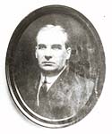 Oval, black and white image of Joe Boyle.